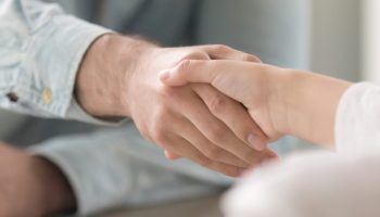 Businessman,Shaking,Hands,With,Businesswoman,,Client,And,Agent,Greeting,Gesture.